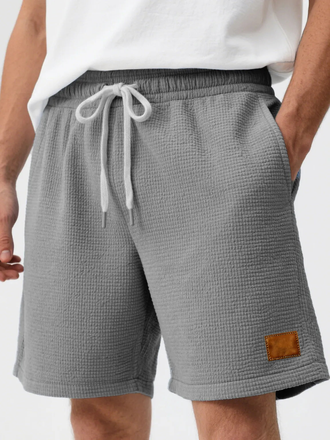 Men's Fashion Casual Waffle Fabric Embroidered Logo Lace-up Loose Shorts